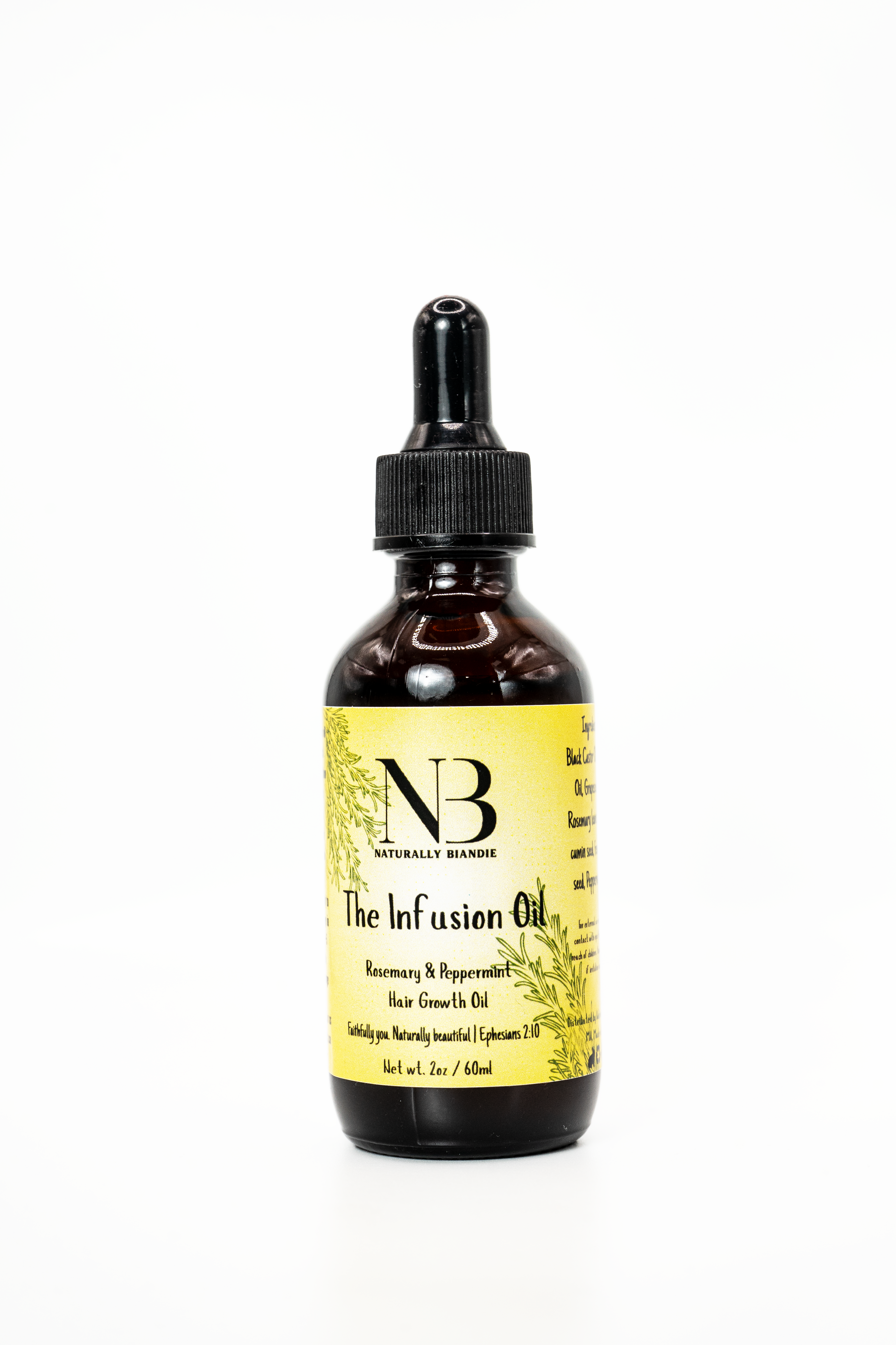 Bottle of 'The Infusion Oil' with a yellow label on a white background